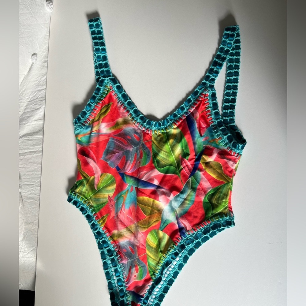 Bright colored swimsuit with crochet detail